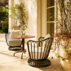 Gubi Carmel Bistro Dining Table 24 Gubi Carmel Bistro Dining Table -Danish Design Store 0073 GUBI Spring2025 Campaign 038 e9caf1c4 6129 4bb1 917f f924bef4e5b6