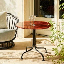 Gubi Carmel Bistro Dining Table 20 Gubi Carmel Bistro Dining Table -Danish Design Store 0075 GUBI Spring2025 Campaign 037 2 158cf36d b1de 4758 9bcd e531f10b8c4e
