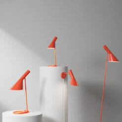 Louis Poulsen AJ Table Lamp -Danish Design Store AW23 AJ Electric Orange Family2 Podium Studio 60491 5a4874f7 8f94 4540 b91d d8bffa3d6b6a