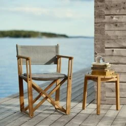 Kryss Lounge Chair 30 Kryss Lounge Chair -Danish Design Store KRYSS LOUNGE CHAIR Teak Sunbrella Reneisance fabric dark grey