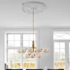 Apiales 18 Chandelier 34 Apiales 18 Chandelier -Danish Design Store Nuura Apiales 18 Brushed Brass Finish Opal White glass lifestyle 1 564f375e 2297 42de af15 92745100fbed