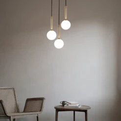 Miira 3 Chandelier -Danish Design Store Nuura Miira 3 Brass Opal White lifestyle