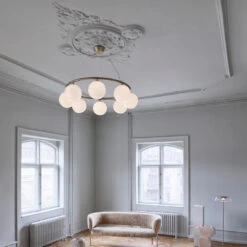 Miira 8 Circular Chandelier 39 Miira 8 Circular Chandelier -Danish Design Store Nuura Miira 8 Circular Brass lifestyle 1