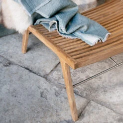 RIB Outdoor Lounge Chair -Danish Design Store Sibast RIB outdoor lounge chair setting with blanket 1