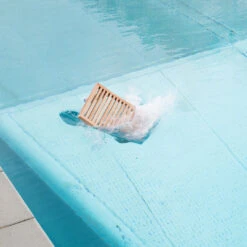 RIB Outdoor Stool 13 RIB Outdoor Stool -Danish Design Store SibastRIBoutdoorstoolsettinginpool