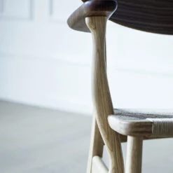 CH22 Lounge Chair 24 CH22 Lounge Chair -Danish Design Store Wegner CH22 oak walnut mix detail armrest